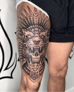 tatto de caveira na coxa