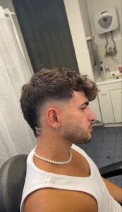 corte mullet masculino com risco e degrade